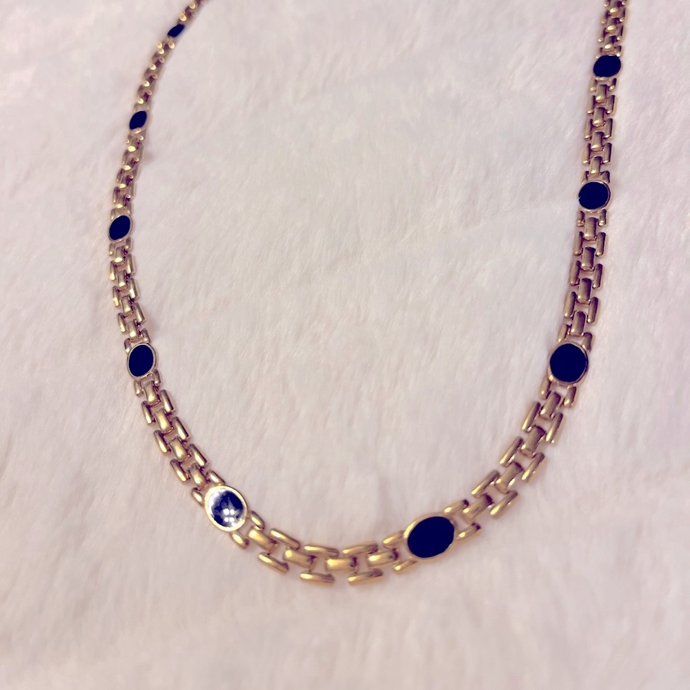 Gold and black necklace